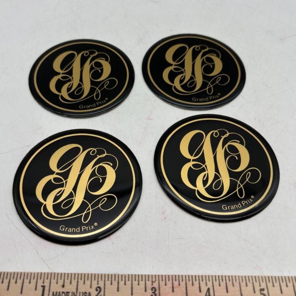Vintage Grand Prix GP Gold Black Wheel Center Cap Emblems Set of 4